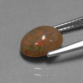 Ópalo chocolate multicolor natural de 1,42 ct, corte óvalo, opaco