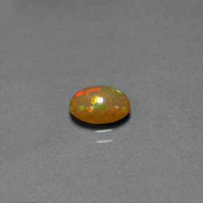 Ópalo chocolate multicolor natural de 0,68 ct, transparente, transparente / translúcido