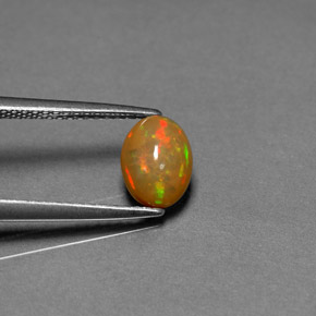 Ópalo chocolate multicolor natural de 0,68 ct, transparente, transparente / translúcido