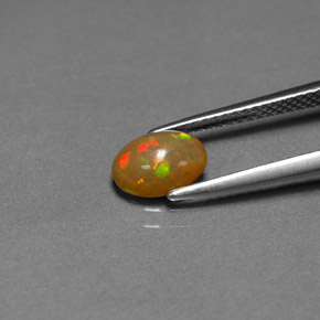 Ópalo chocolate multicolor natural de 0,68 ct, transparente, transparente / translúcido