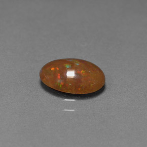 Ópalo chocolate multicolor natural de 0,83 ct, corte óvalo, opaco