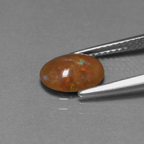 Ópalo chocolate multicolor natural de 0,83 ct, corte óvalo, opaco