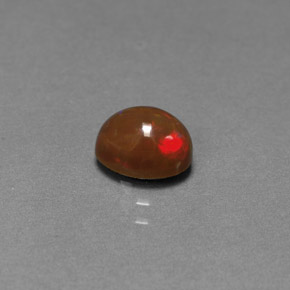Ópalo chocolate multicolor natural de 0,77 ct, corte óvalo, opaco