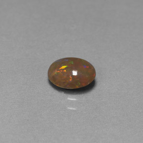 Ópalo de chocolate Multicolor natural de 0.60 ct, Corte Óvalo, Opaco