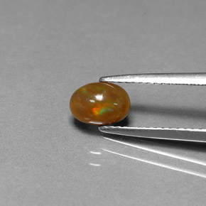 Ópalo de chocolate Multicolor natural de 0.54 ct, Corte Óvalo, Opaco