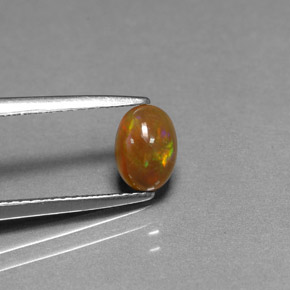 Ópalo de chocolate Multicolor natural de 0.54 ct, Corte Óvalo, Opaco