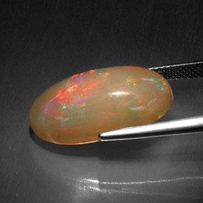 Ópalo chocolate multicolor natural de 10,52 ct, corte óvalo, opaco