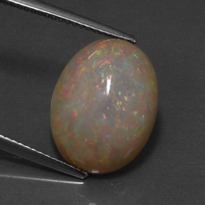 Ópalo chocolate multicolor natural de 5,59 ct, corte óvalo, opaco