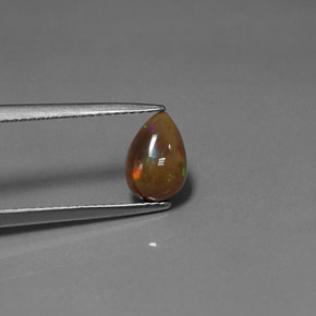 Ópalo chocolate multicolor natural de 0,92 ct, en forma de pera, opaco