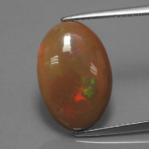 Ópalo chocolate multicolor natural de 4,08 ct, corte óvalo, opaco