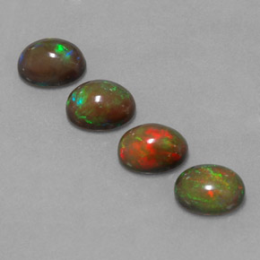 Gemas de ópalo chocolate multicolor natural de  ct, corte óvalo, translúcido