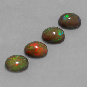 Gemas de ópalo chocolate multicolor natural de  ct, corte óvalo, translúcido
