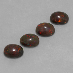 Gemas de ópalo chocolate multicolor natural de 3,23 ct, corte óvalo, translúcido