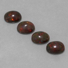 Gemas de ópalo chocolate multicolor natural de 3,23 ct, corte óvalo, translúcido
