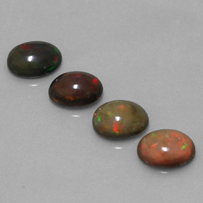 Gemas de ópalo chocolate multicolor natural de  ct, corte óvalo, translúcido