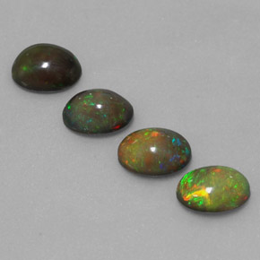 Gemas de ópalo chocolate multicolor natural de  ct, corte óvalo, translúcido