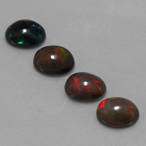 Gemas de ópalo chocolate multicolor natural de 3,57 ct, corte óvalo, translúcido