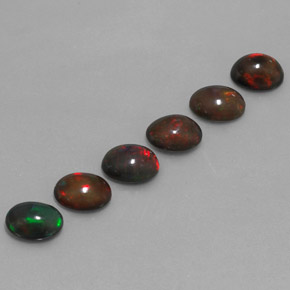 Gemas de ópalo chocolate multicolor natural de 4,61 ct, corte óvalo, translúcido