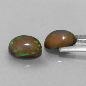 Gemas de ópalo chocolate multicolor natural de  ct, corte óvalo, translúcido