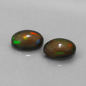 Gemas de ópalo chocolate multicolor natural de  ct, corte óvalo, translúcido