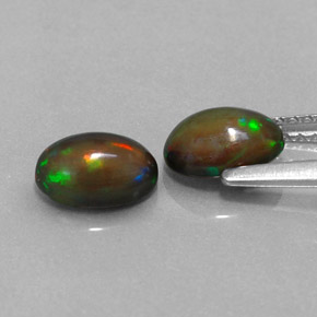 Gemas de ópalo chocolate multicolor natural de  ct, corte óvalo, translúcido