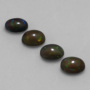 Gemas de ópalo chocolate multicolor natural de 2,39 ct, corte óvalo, translúcido
