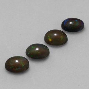 Gemas de ópalo chocolate multicolor natural de 2,39 ct, corte óvalo, translúcido
