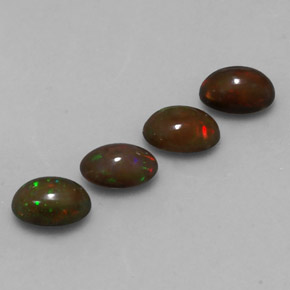 Gemas de ópalo chocolate multicolor natural de 1,88 ct, corte óvalo, translúcido