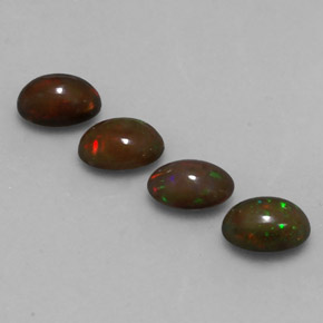 Gemas de ópalo chocolate multicolor natural de 1,88 ct, corte óvalo, translúcido