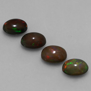 Gemas de ópalo chocolate multicolor natural de 2,29 ct, corte óvalo, translúcido