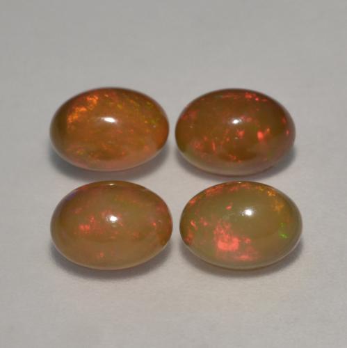 Gemas de ópalo chocolate multicolor natural de 2,83 ct, corte óvalo, translúcido
