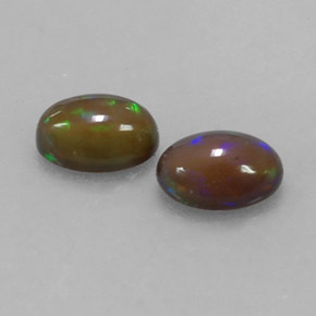 Gemas de ópalo chocolate multicolor natural de  ct, corte óvalo, translúcido