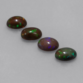 Gemas de ópalo chocolate multicolor natural de  ct, corte óvalo, translúcido