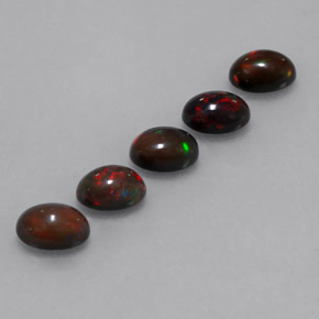 Gemas de ópalo chocolate multicolor natural de 2,71 ct, corte óvalo, translúcido