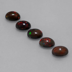 Gemas de ópalo chocolate multicolor natural de 2,71 ct, corte óvalo, translúcido