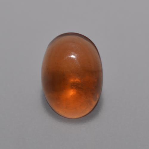 Ópalo chocolate naranja natural de 0,36 ct, corte óvalo, transparente