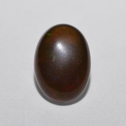 Ópalo chocolate multicolor natural de 0,52 ct, corte óvalo, translúcido