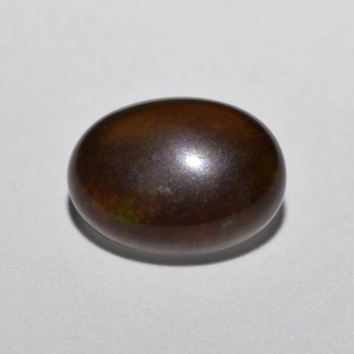 Ópalo chocolate multicolor natural de 0,52 ct, corte óvalo, translúcido