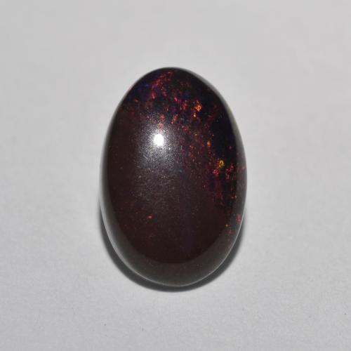 Ópalo chocolate multicolor natural de 0,80 ct, corte óvalo, translúcido
