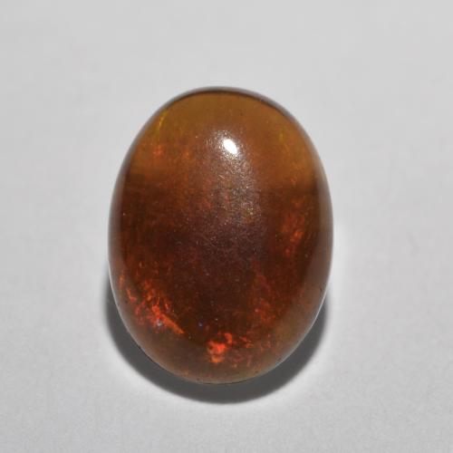 Ópalo de chocolate Multicolor natural de 0.68 ct, Corte Óvalo, Translúcido