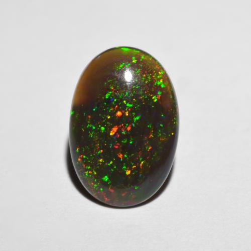 Ópalo chocolate multicolor natural de 0,98 ct, corte óvalo, translúcido
