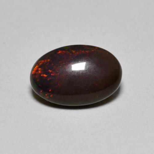 Ópalo chocolate multicolor natural de 0,80 ct, corte óvalo, translúcido