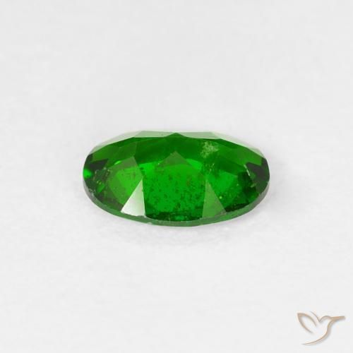 Diópsido de cromo Verde bosque claro natural de 0.67 ct, Ovalada, VS-SI