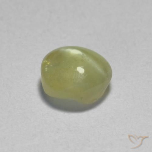 Crisoberilo Ojo de Gato Amarillo crema pálido natural de 0.46 ct, Ovalada, Translúcido