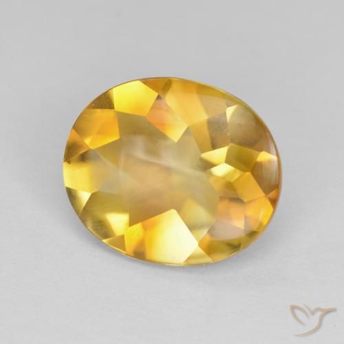 Citrino Naranja dorado intenso natural de 3.81 ct, Ovalada, Transparente