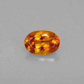 Clinohumite Naranja amarillo natural de 0.48 ct, Corte Óvalo, VS