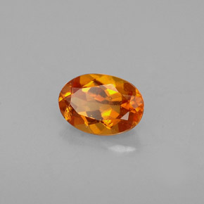 Clinohumite Naranja amarillo natural de 0.48 ct, Corte Óvalo, VS
