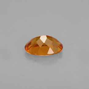 Clinohumite Naranja amarillo natural de 0.48 ct, Corte Óvalo, VS