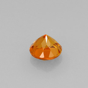 Clinohumita naranja natural de 0,64 ct, corte redondo, VS