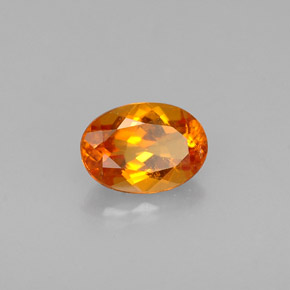 Clinohumite Naranja amarillo natural de 0.56 ct, Corte Óvalo, VS